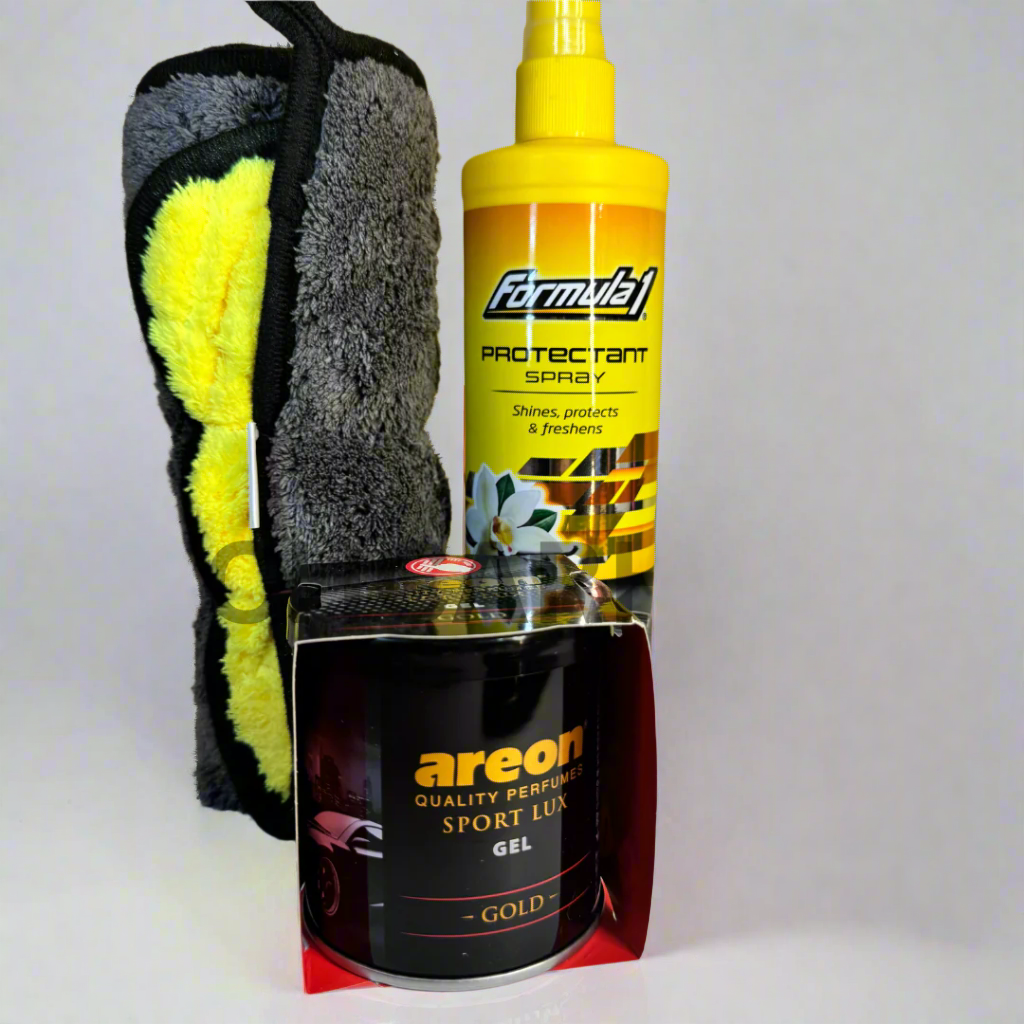 Car interior care kit – protectant spray, fragrance gel, and cloth for easy cabin refresh.