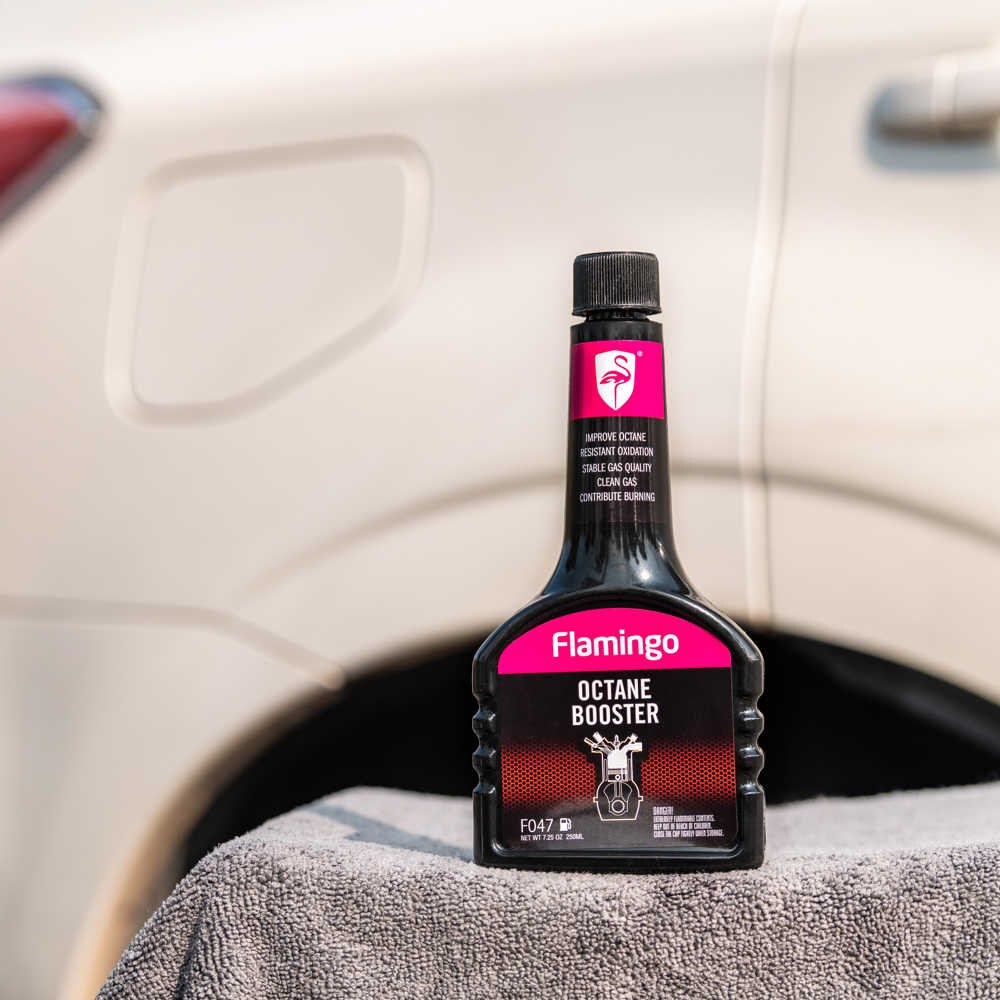 Close-up of Flamingo Octane Booster showcasing its fuel-stabilizing properties – by TechCarHome.com.