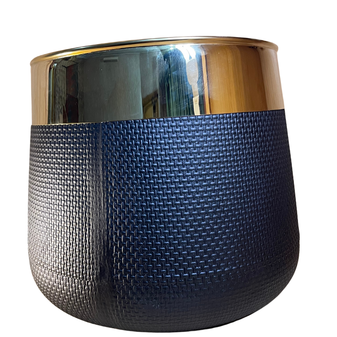 Close-up of the black fiber planter highlighting its sleek and durable design.