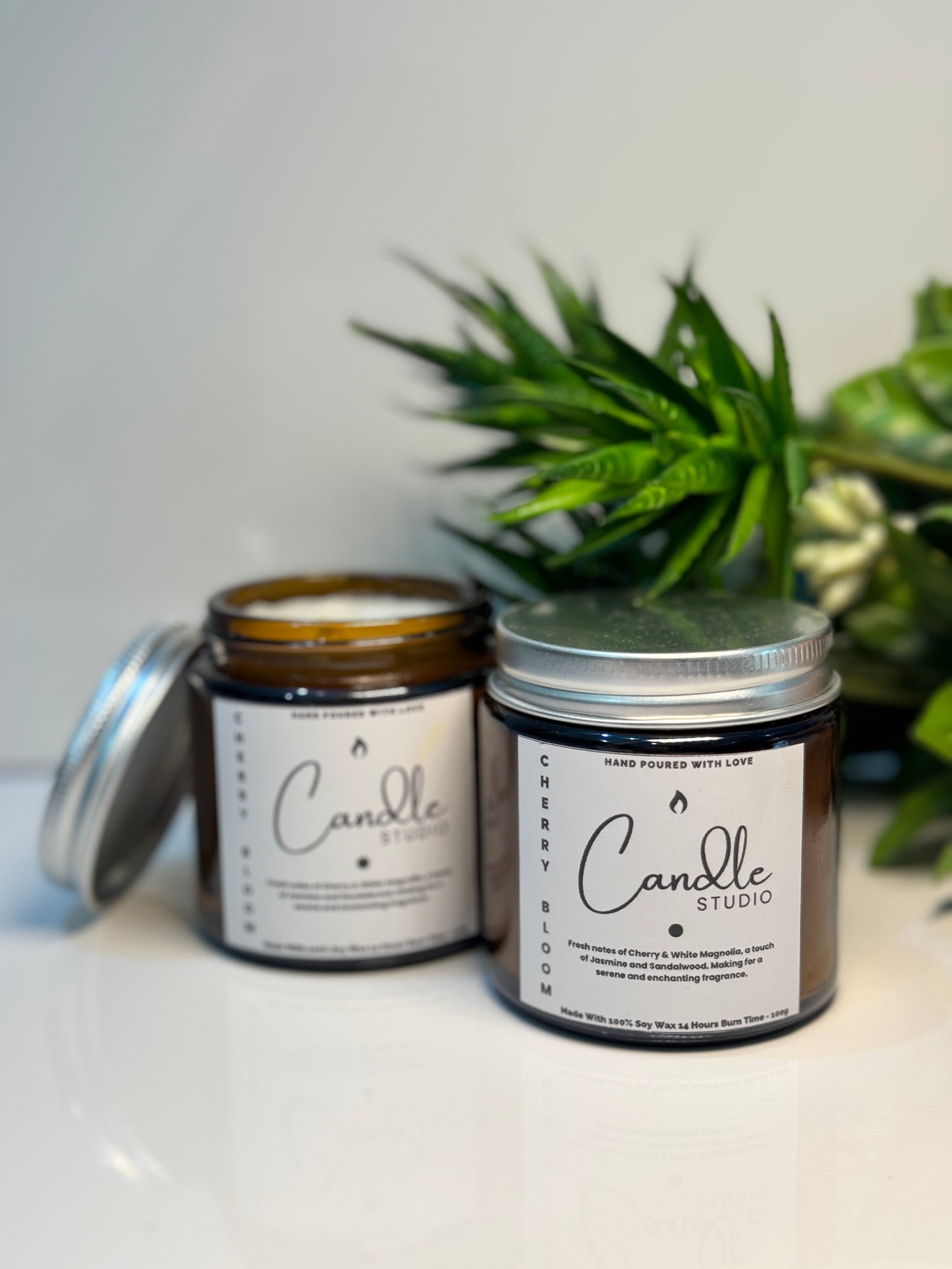 Elegant Cherry Bloom candle in a sleek glass jar, ideal for home decor and relaxation