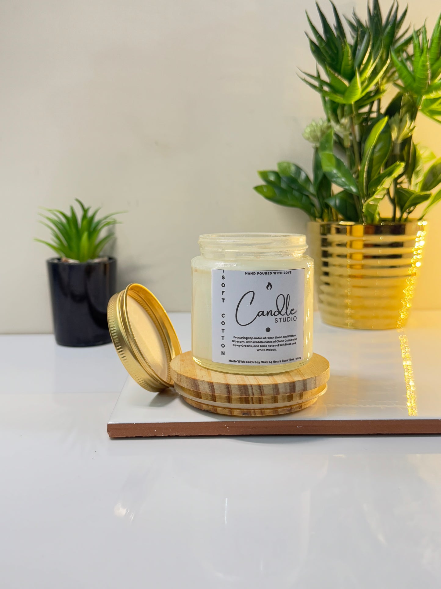 Soft Cotton candle in a sleek jar, showcasing its fresh and minimalist design.