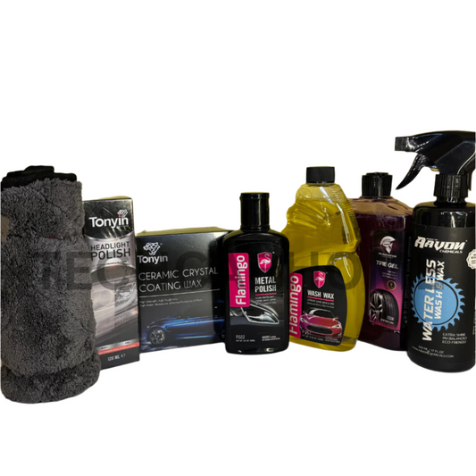 7-piece car detailing kit displayed on mustard yellow background including top-rated wash, wax, tire, and metal polish products.