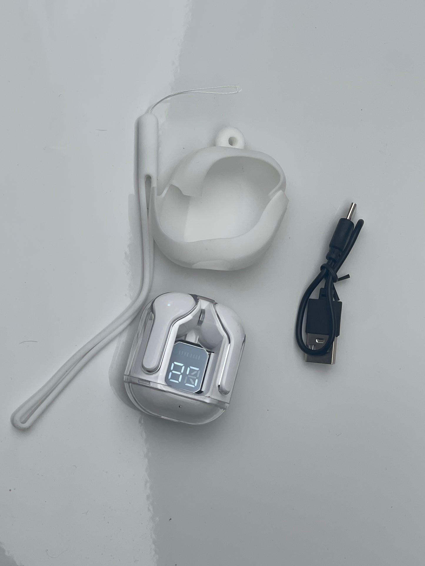 Air 31 Earbuds - Compact charging case with earbuds placed neatly inside