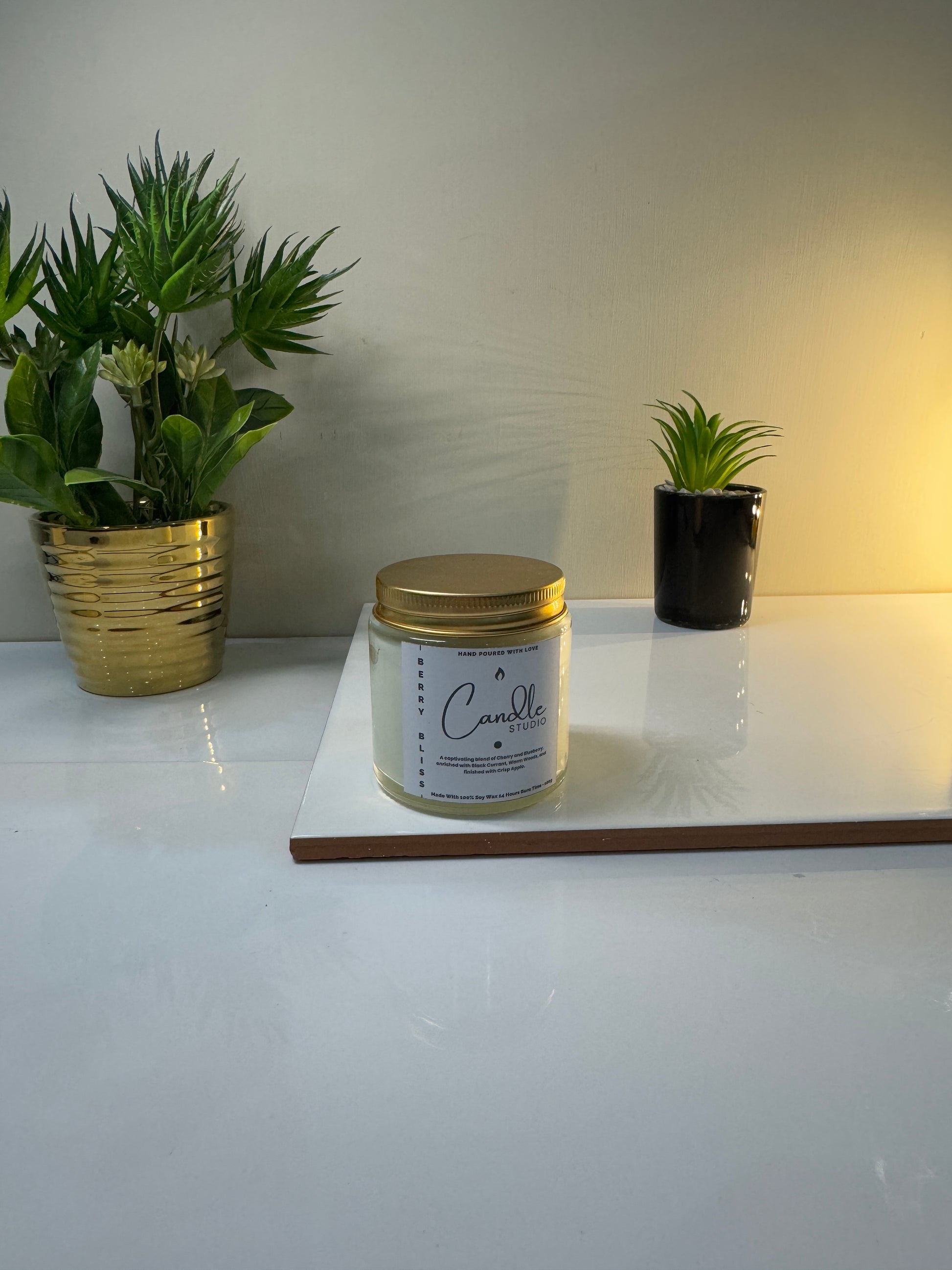 Berry Bliss candle placed on a decorative table, adding a sweet and inviting touch to the room.