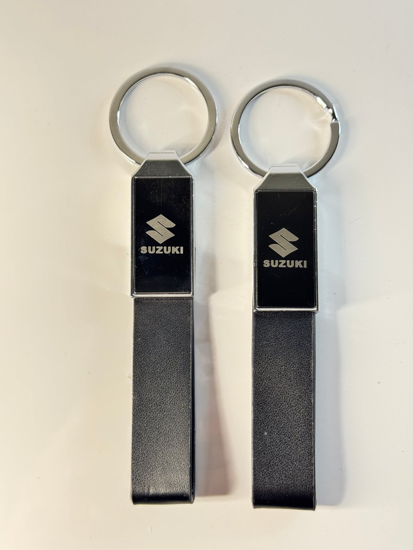 Black Premium Leather Suzuki Car Keychain – Durable Metal & Sleek Design – Tech Car Home Pakistan