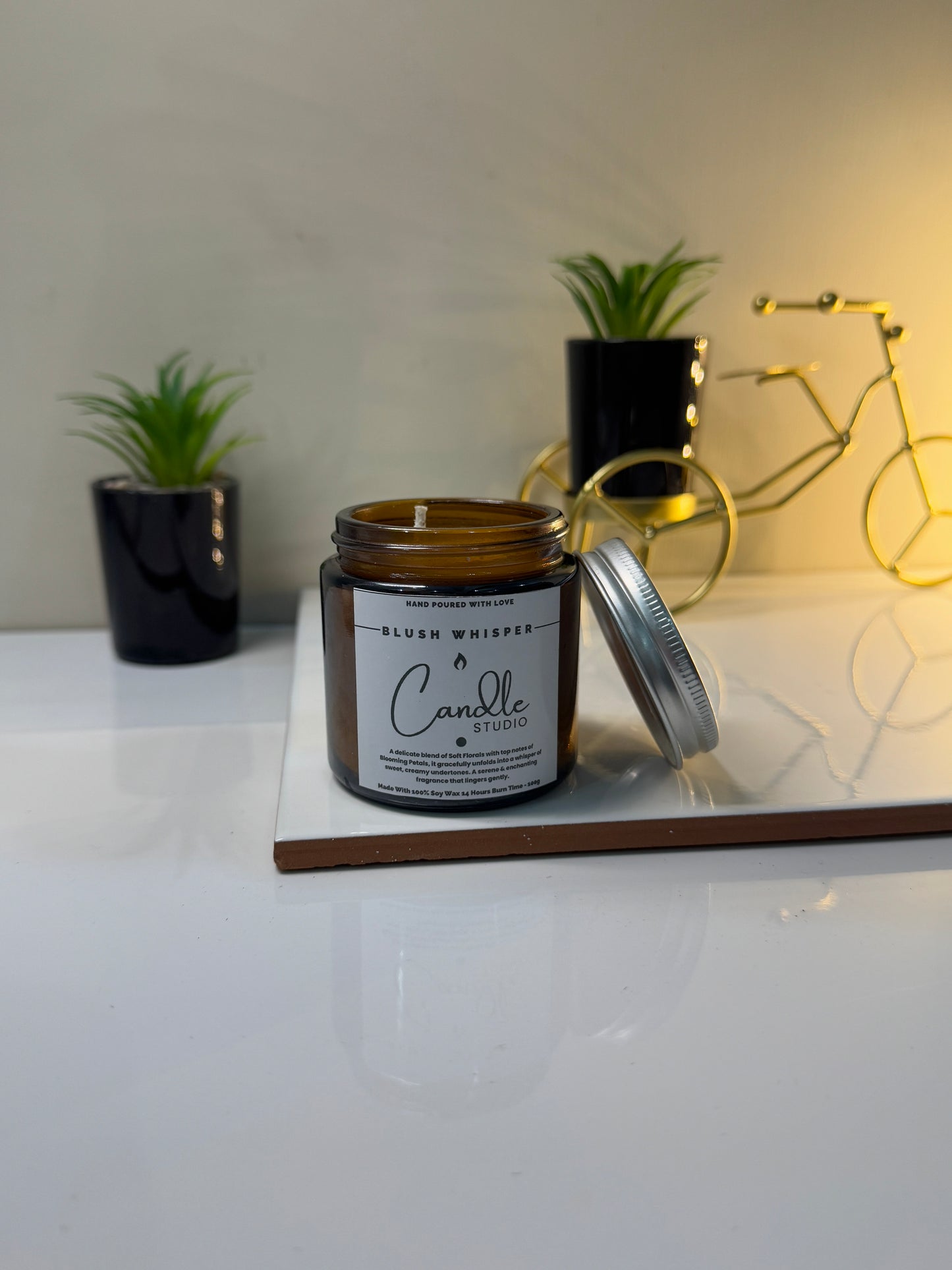Blush Whisper candle placed in a decorative holder, ready to illuminate your space with its subtle charm.