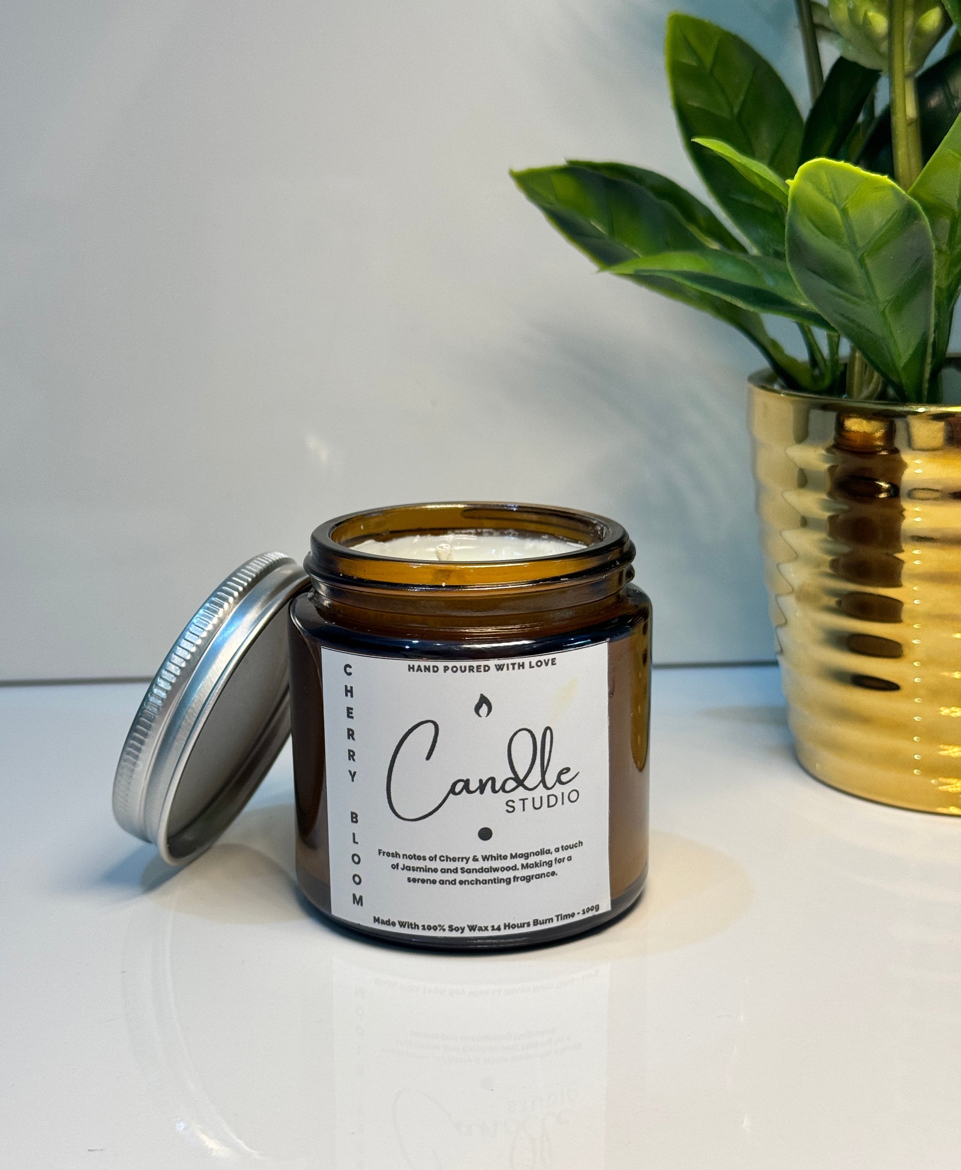 Cherry Bloom scented candle with a minimalist design, capturing the essence of blooming cherry blossoms.