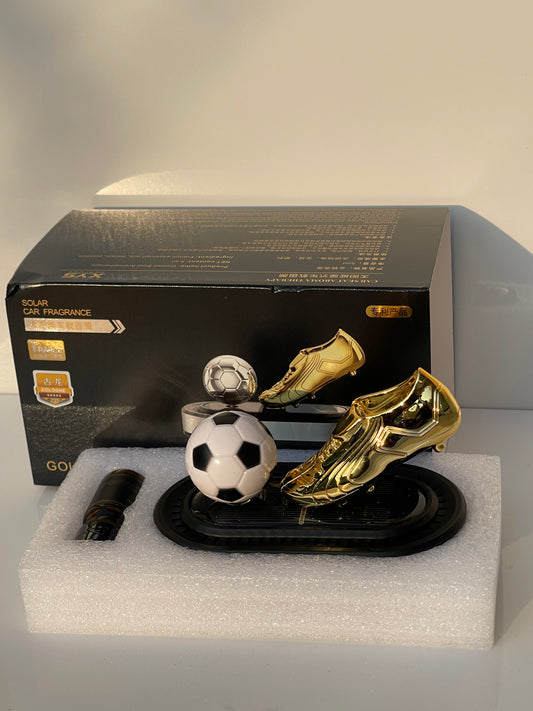 Close-up of Solar Powered Rotating Football Car Perfume