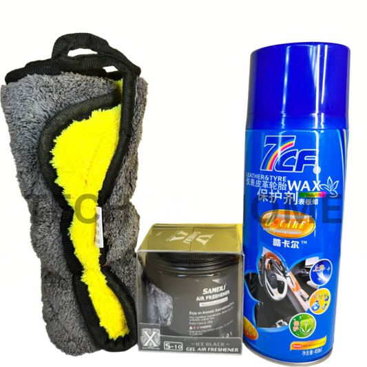 Close-up of car detailing products from the Ultimate Protection Bundle – showcasing wax, sprays, and cloth for full vehicle shine.
