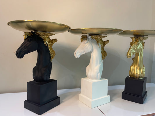 Close-up of the intricate golden plate detailing on a resin horse head, highlighting craftsmanship.