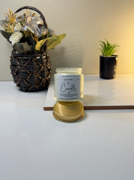 Coffee candle in a sleek jar, showcasing its elegant design and rich coffee aroma.