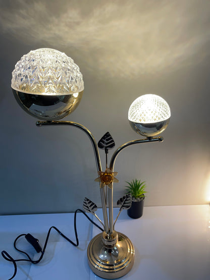 Crystal Ball Stand Lamp with asymmetrical design, featuring a larger crystal ball on the taller side and a smaller one on the lower side.