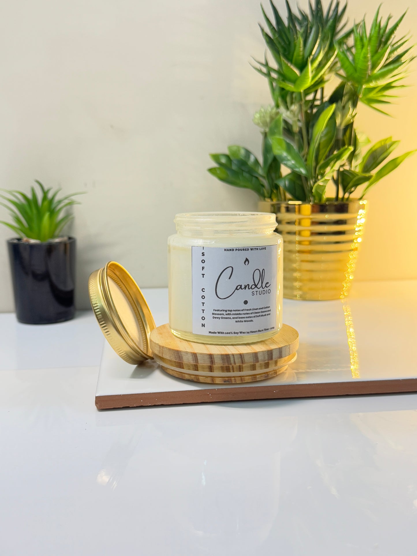 Detailed view of the Soft Cotton candle jar, emphasizing its chic and simple design.