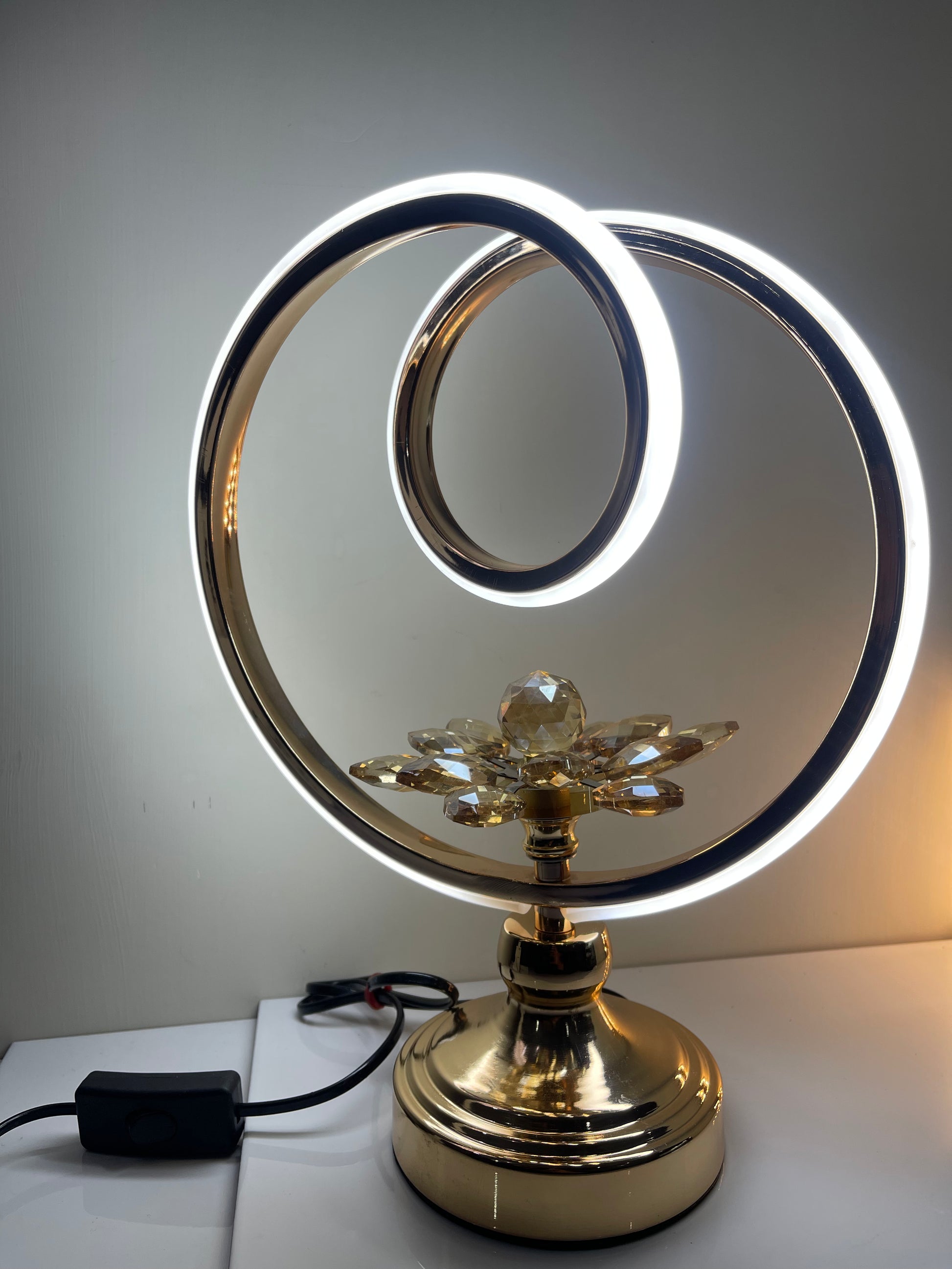 Detailed view of the flower-shaped base of the circle lamp, highlighting its artistic design.