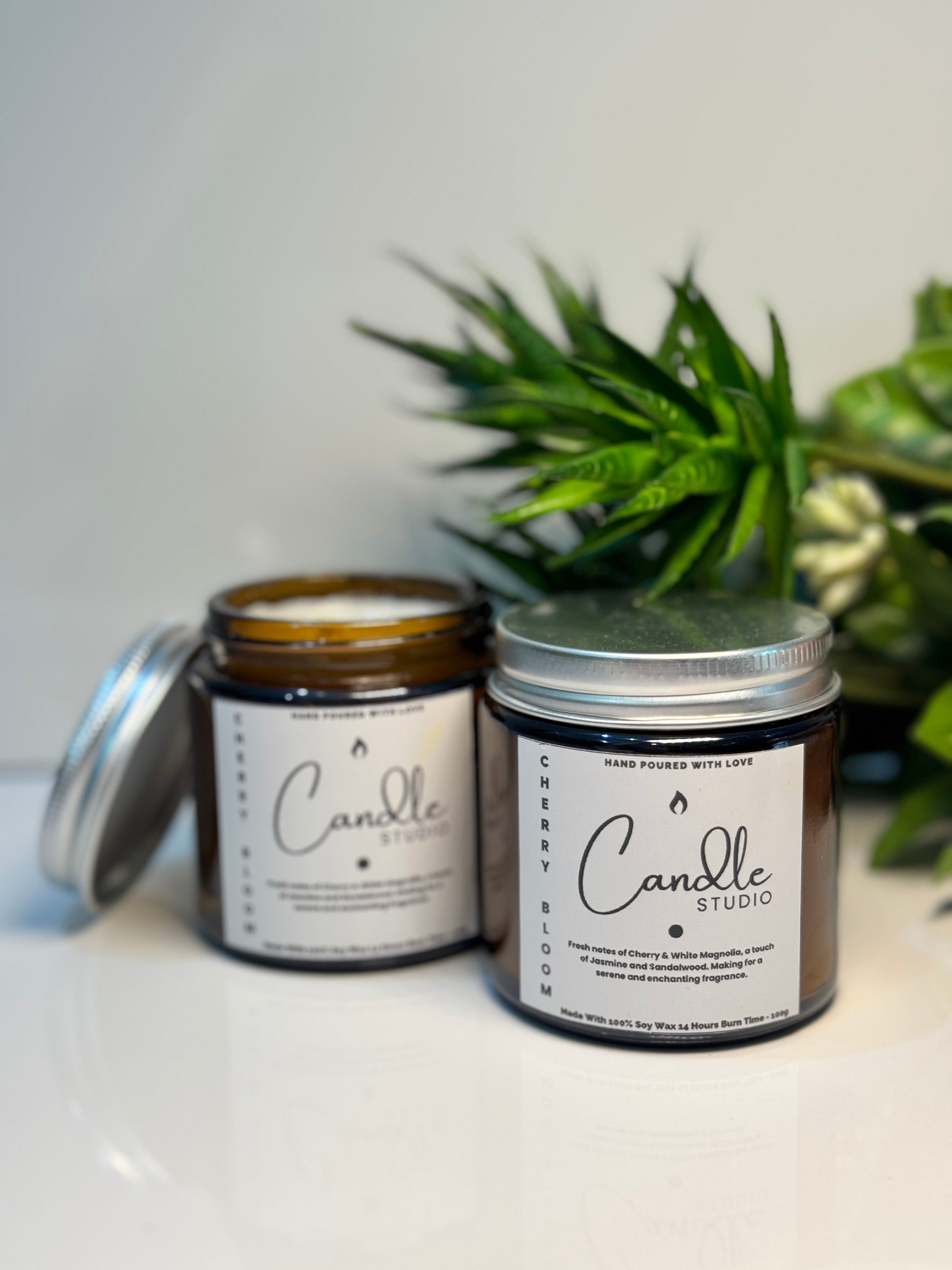 Elegant Cherry Bloom candle in a sleek glass jar, ideal for home decor and relaxation