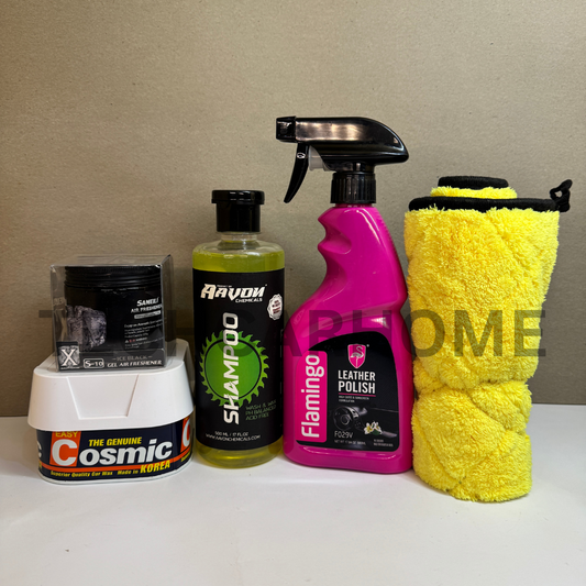 Full Clean & Shine Deluxe Bundle displayed on mustard yellow background – includes shampoo, wax, leather polish, and car perfume