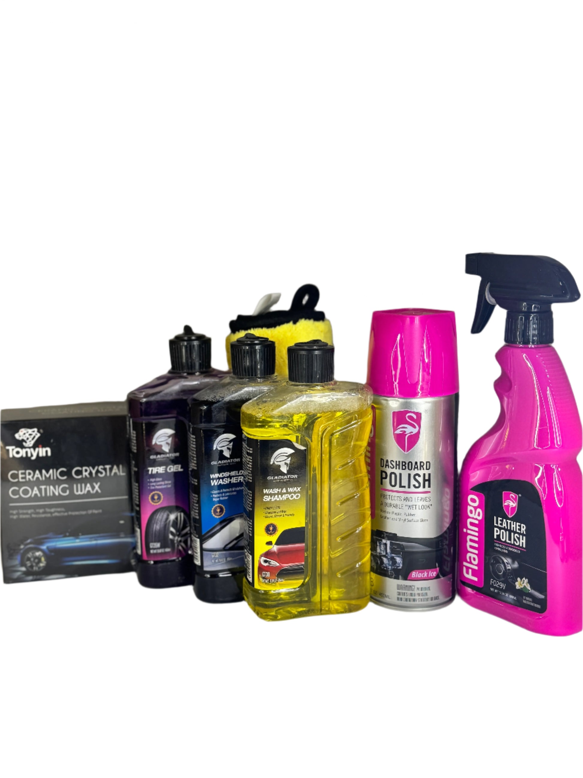 Gladiator Wash & Wax Shampoo, Windshield Washer, and Tire Gel bottles displayed together on a clean car hood