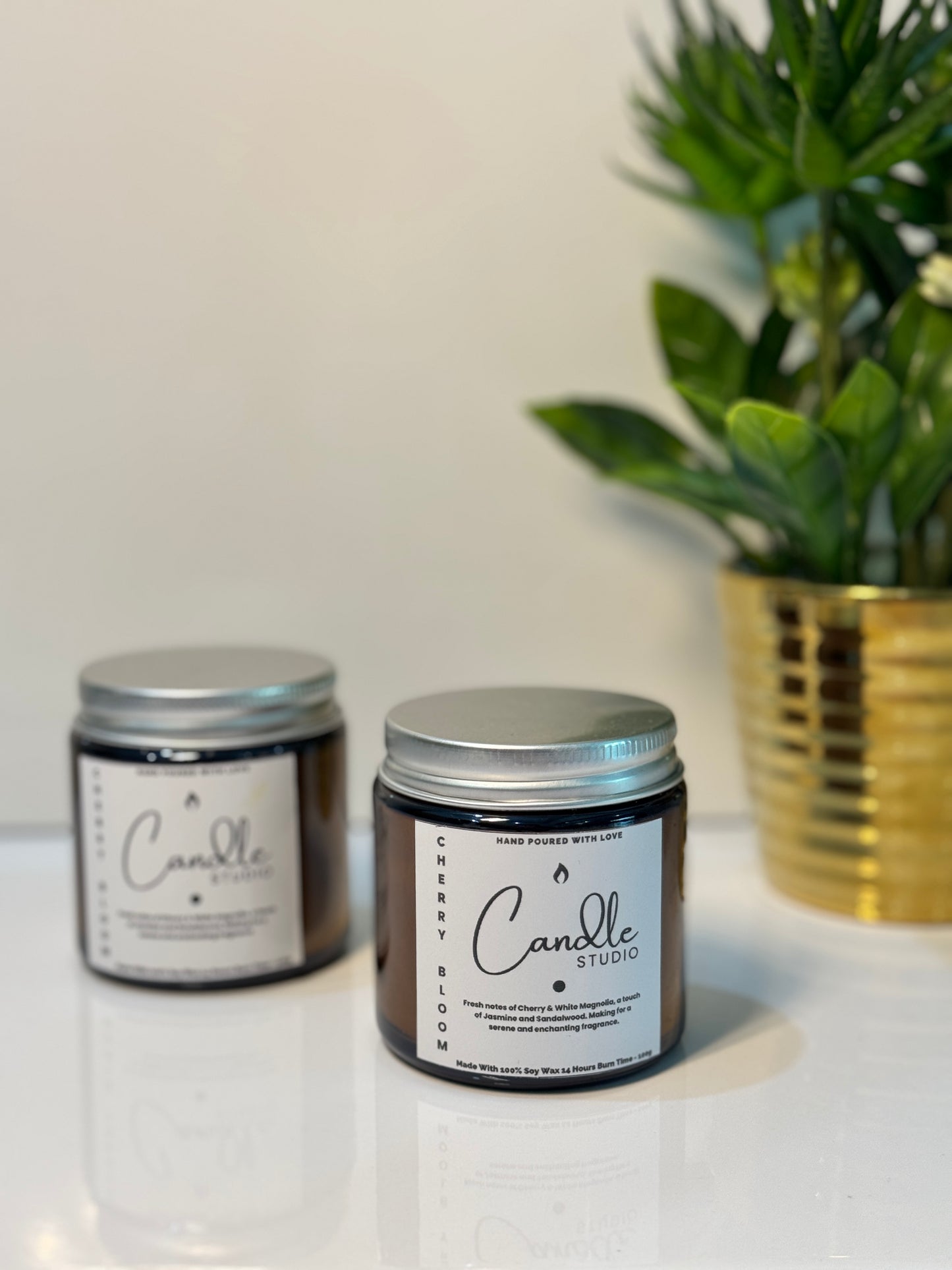 Hand-poured Cherry Bloom candle with a soft floral aroma of cherry blossoms.