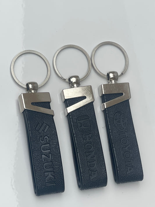 Toyota logo keychain with sleek metallic finish and durable keyring design.