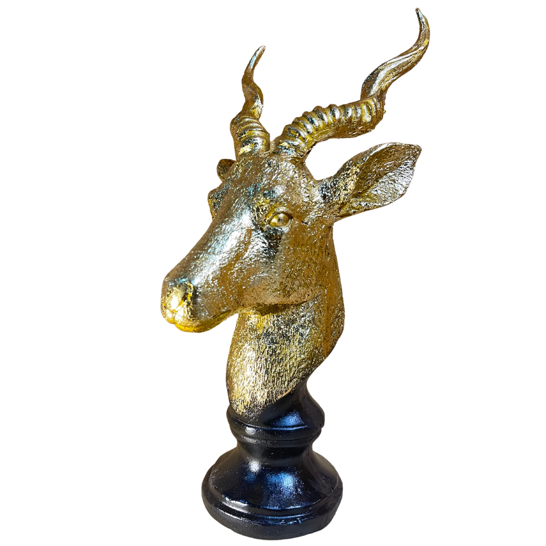 Markhor Statue Showpiece displayed on a living room mantel with intricate details and polished finish.