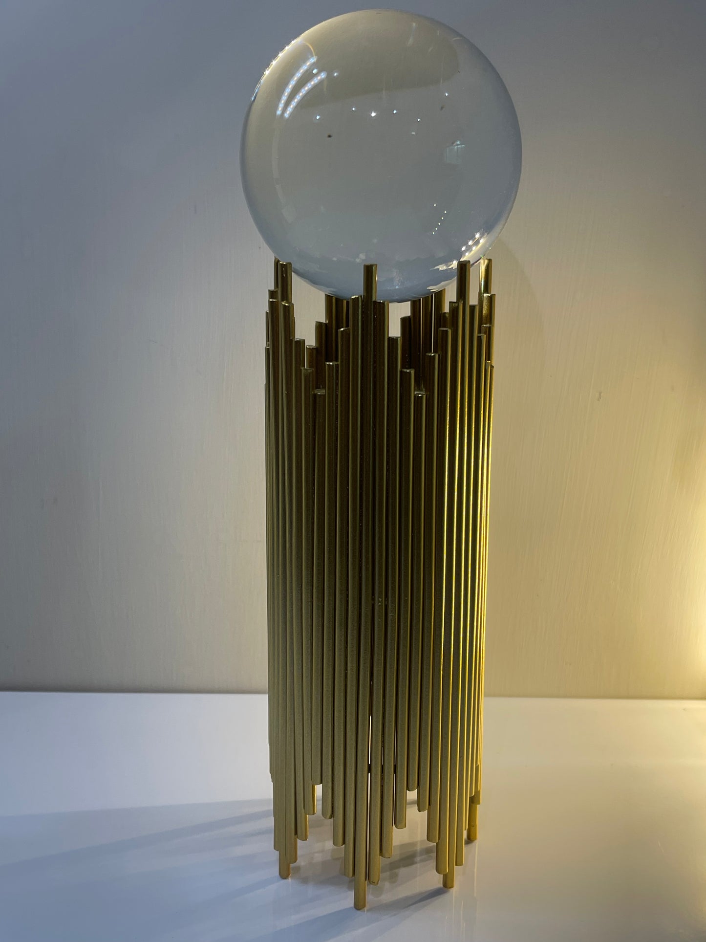 Nordic crystal ball display stand crafted from iron and metal with an elegant design.