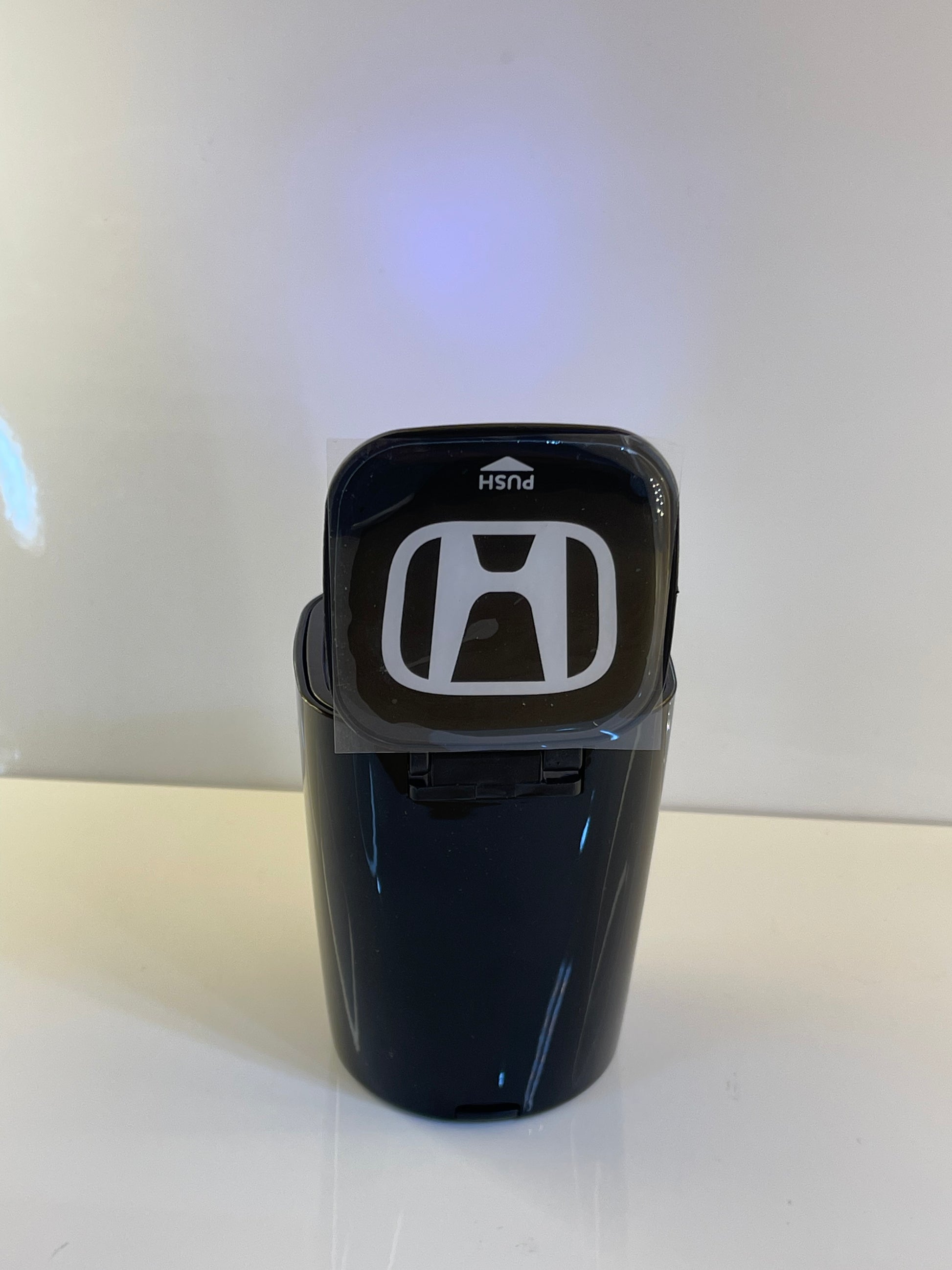  Open view of the Portable Car Ashtray showcasing its easy-to-clean interior – by TechCarHome.com.