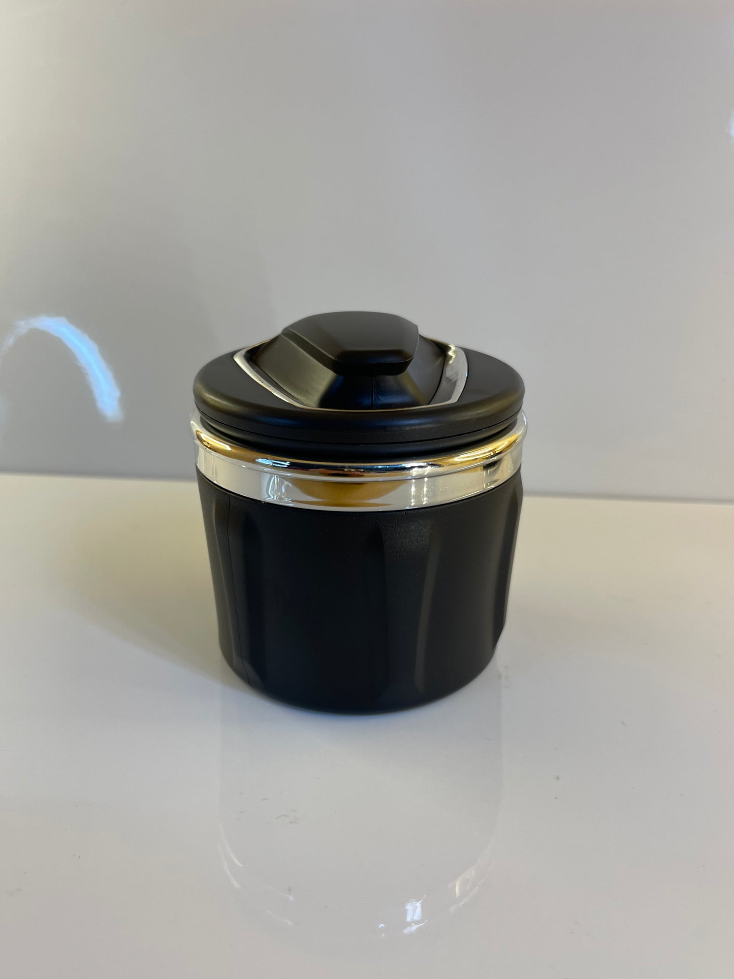 Portable car ashtray with secure lid to contain smoke and odors – by TechCarHome.com.