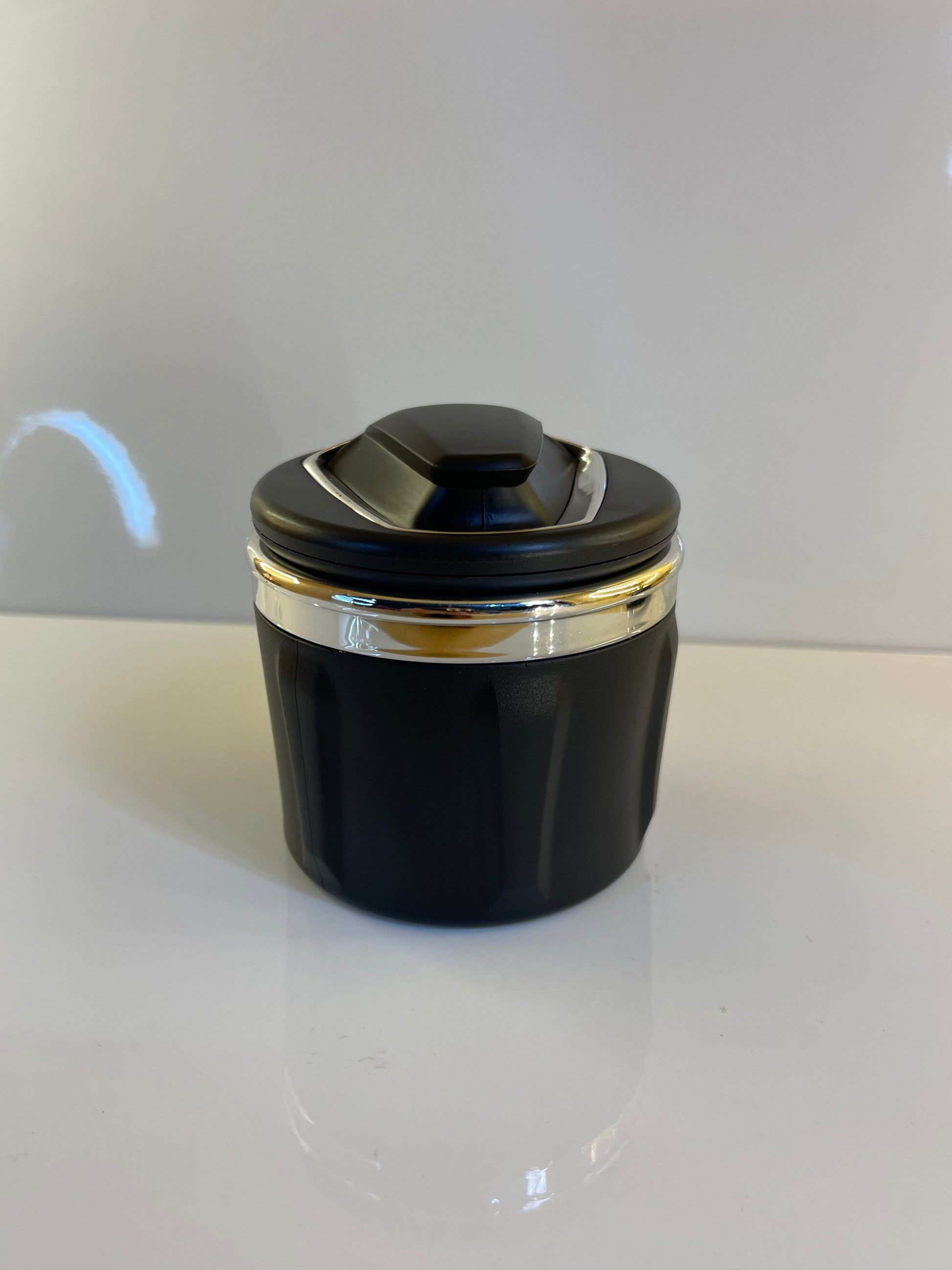 Portable car ashtray with secure lid to contain smoke and odors – by TechCarHome.com.