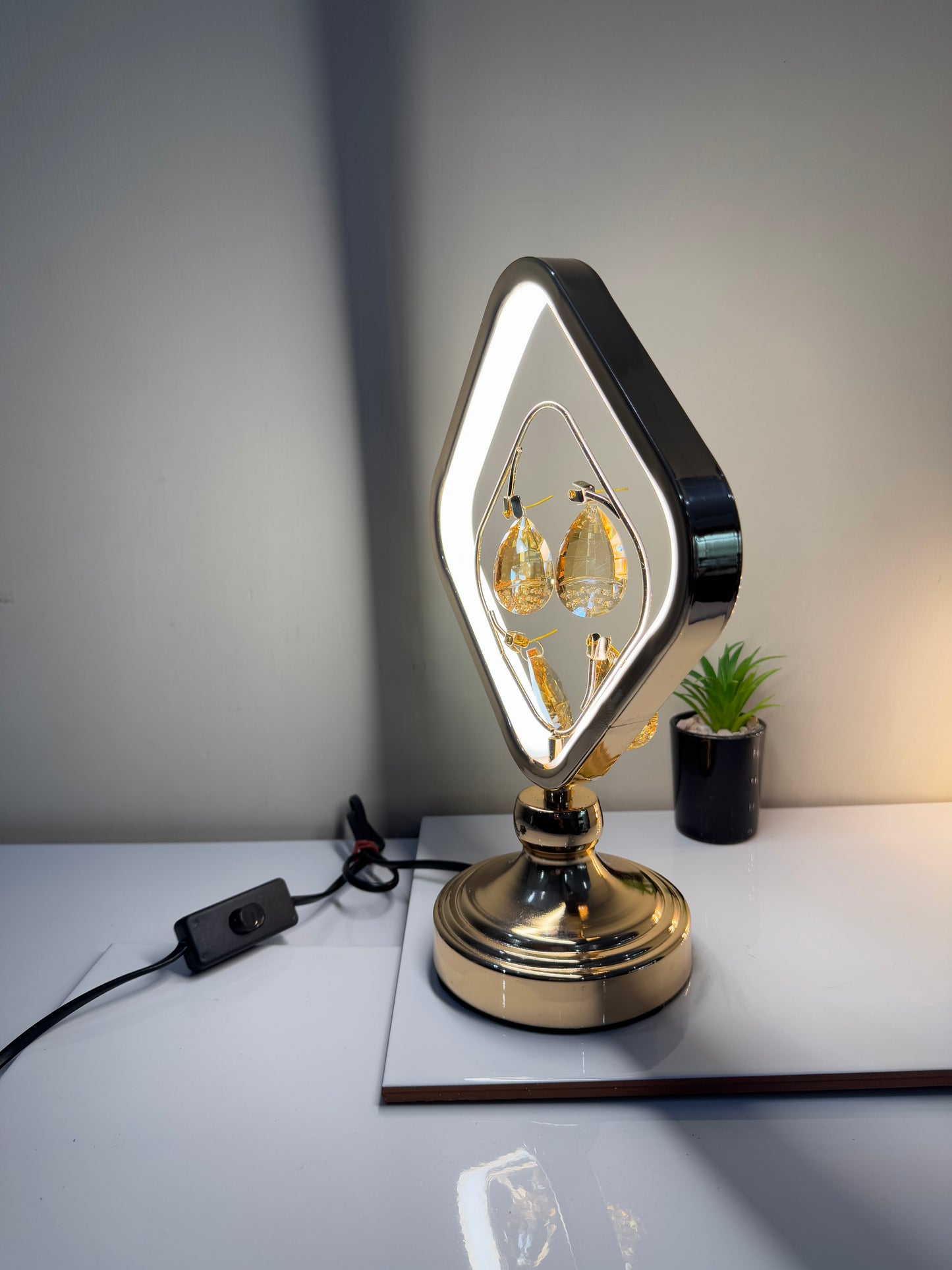 Radiant crystal square lamp illuminated in one of its three adjustable lighting modes.
