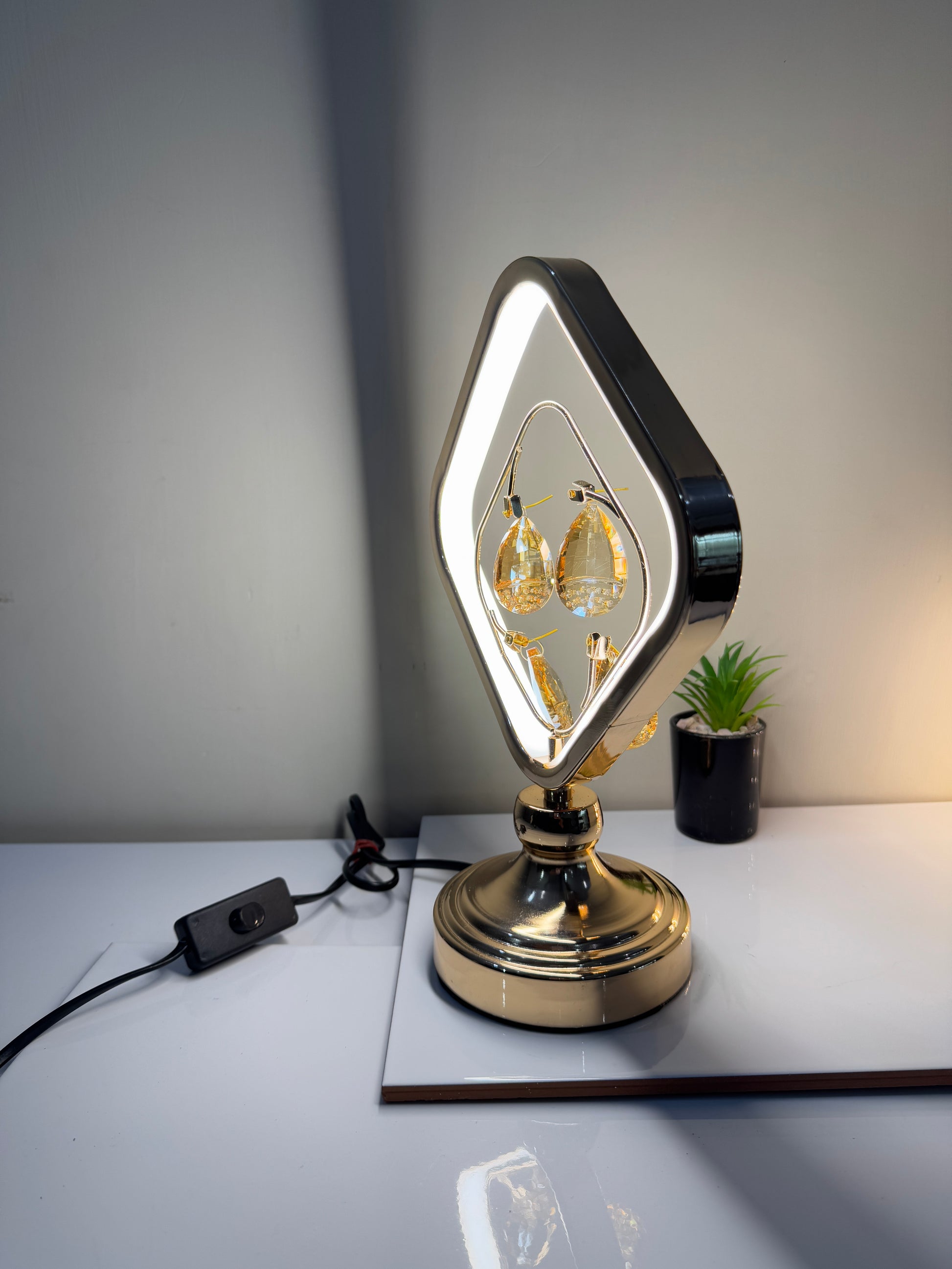Radiant crystal square lamp illuminated in one of its three adjustable lighting modes.