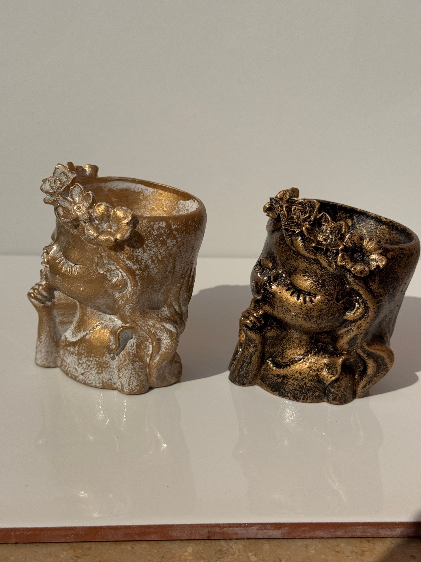Side view of Bohemian Flower Girl Concrete Planter.