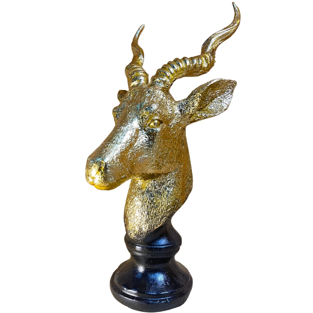 Side view of the elegant Markhor statue adding charm to a modern shelf setup.