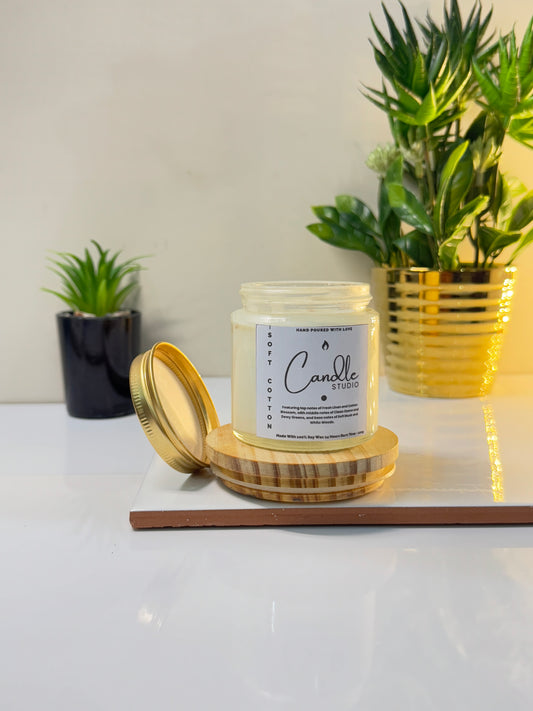 Soft Cotton candle in a sleek jar, showcasing its fresh and minimalist design.