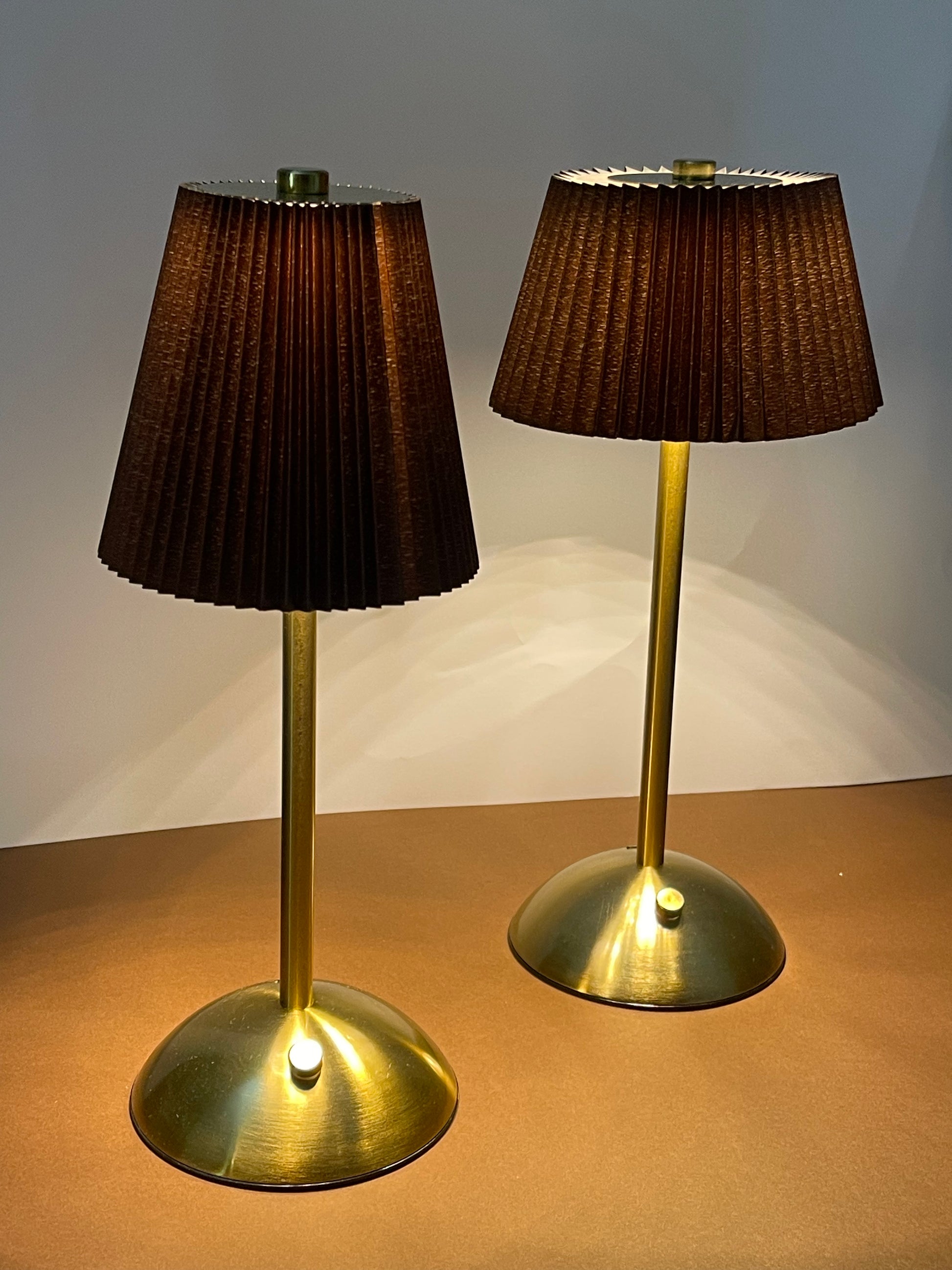 Sophisticated gold table lamp with a vintage-inspired pleated shade, perfect for luxury interiors.