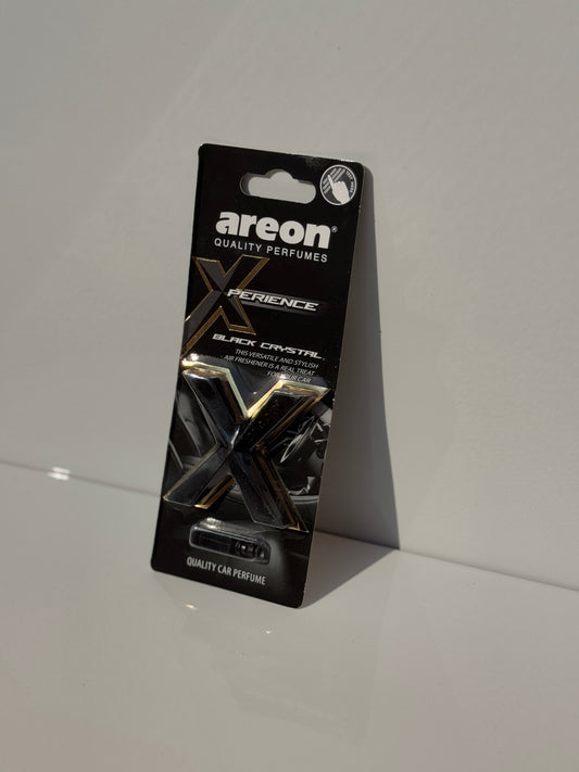 Sophisticated packaging of AREON X-perience Air Freshener Card in 'Black Crystal' scent.