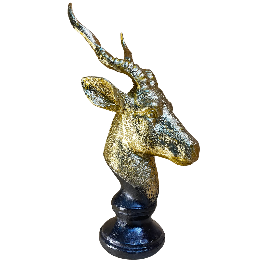 The Markhor Statue Showpiece placed as a centerpiece on an office desk for a sophisticated touch.
