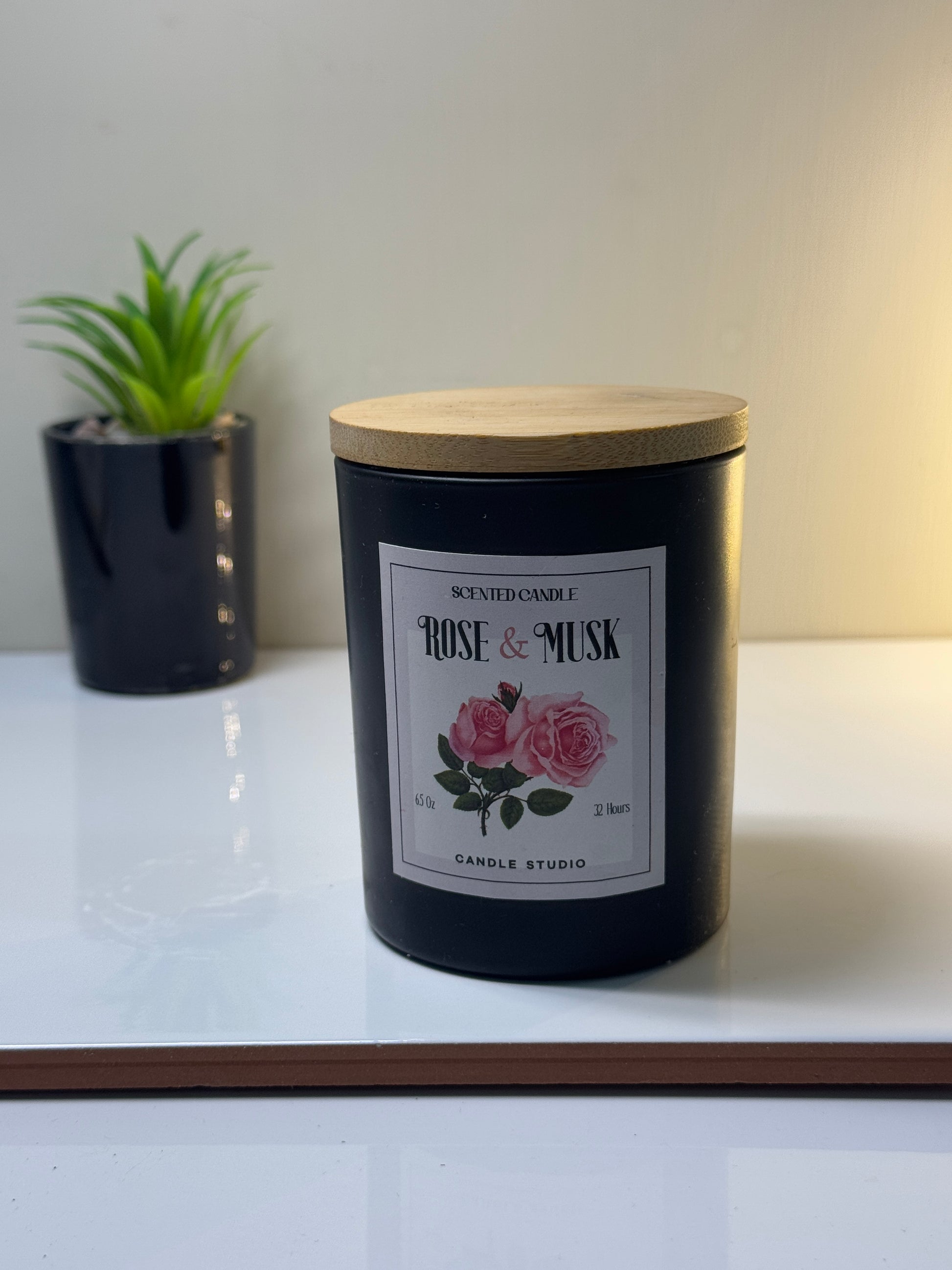 Unlit candle displayed in a decorative holder on a table, adding a touch of elegance to the decor.