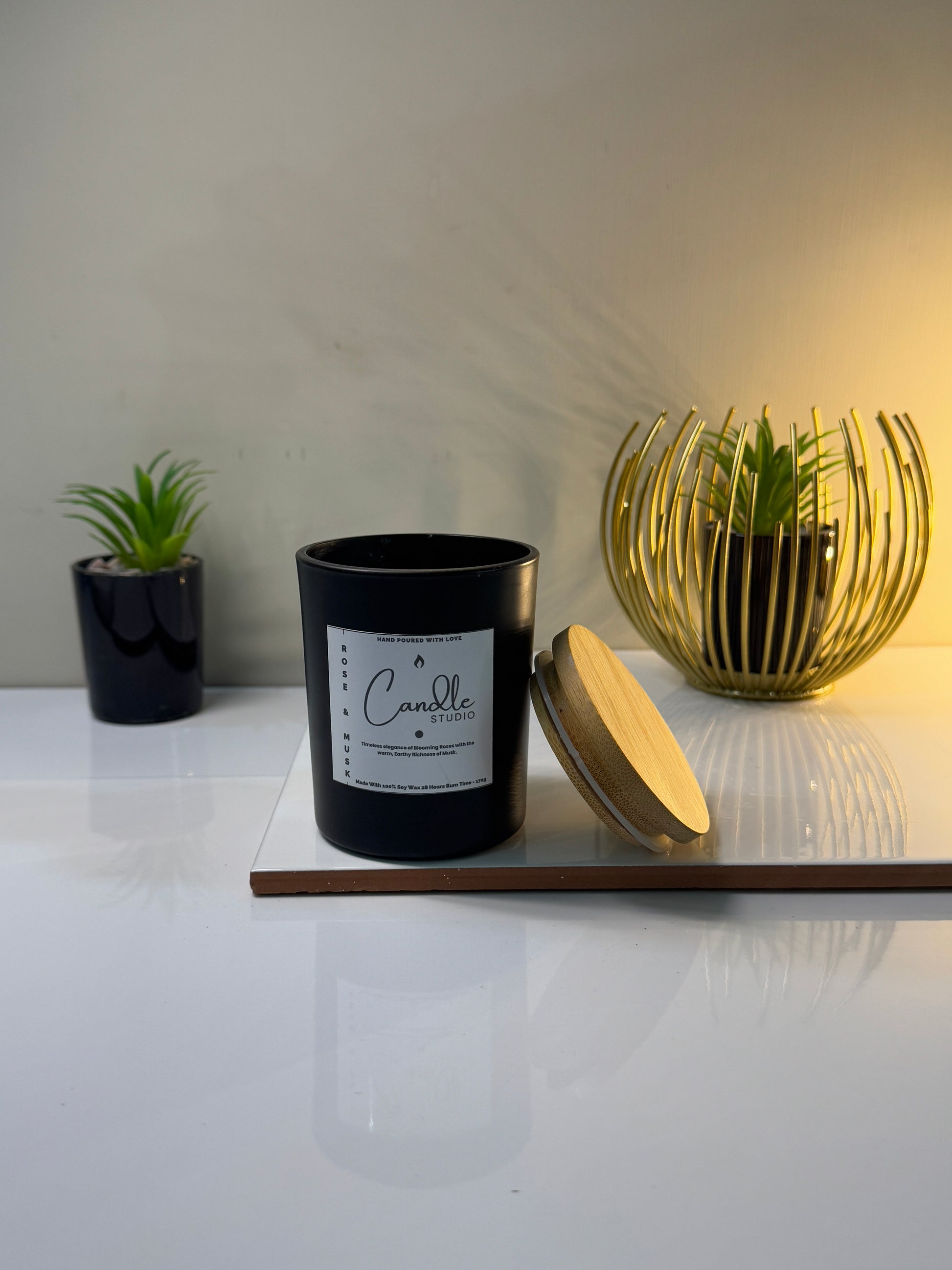 Unlit candle in its holder, ready to provide a warm, cozy ambiance when lit.