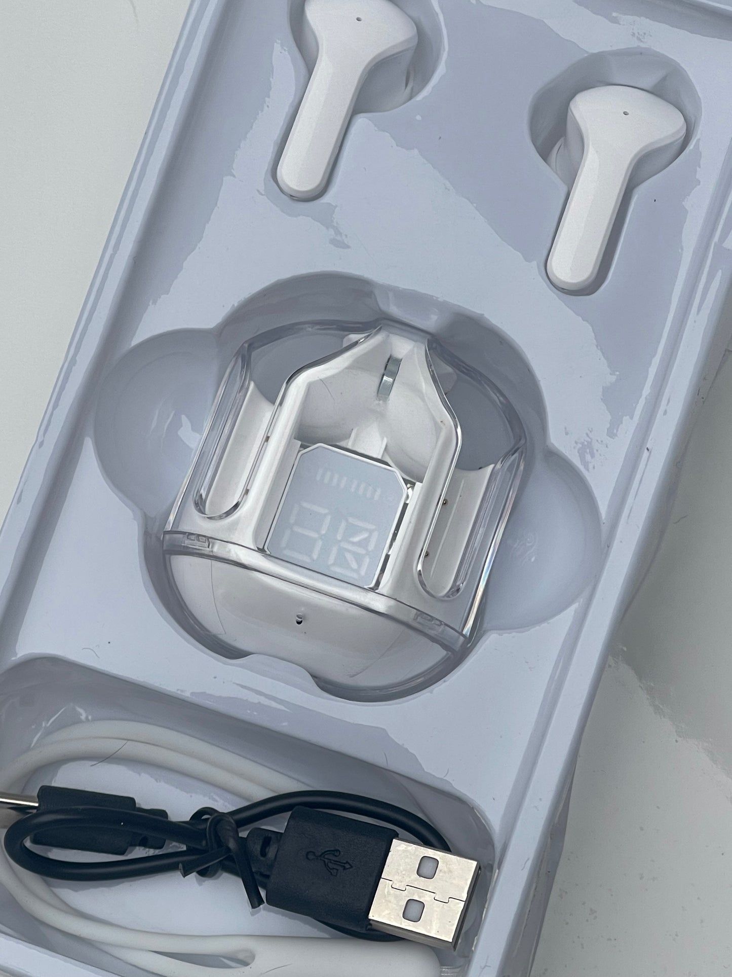 Air 31 Earbuds - Close-up of sleek wireless design in matte black finish