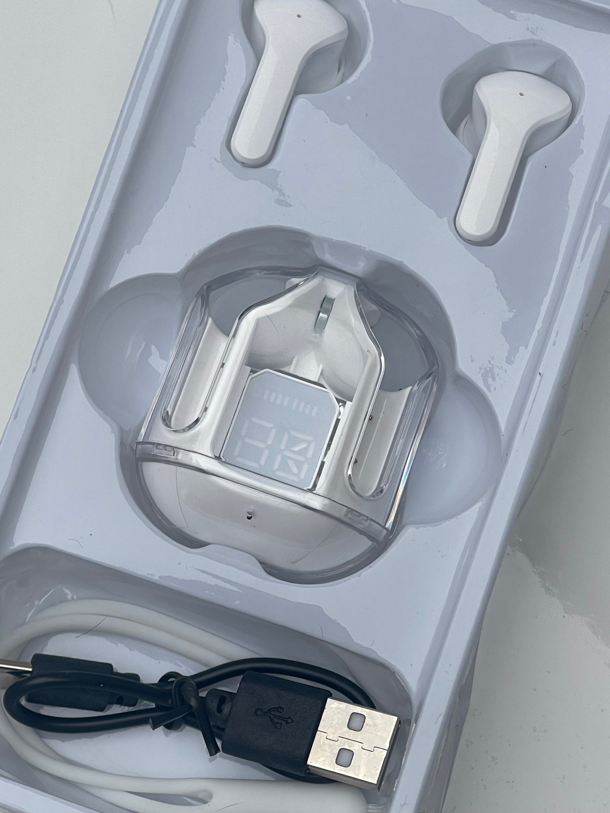 Air 31 Earbuds - Close-up of sleek wireless design in matte black finish