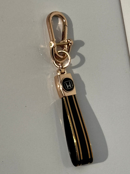 image of hyundai and Honda  logo car keychain in gold color premium quality 