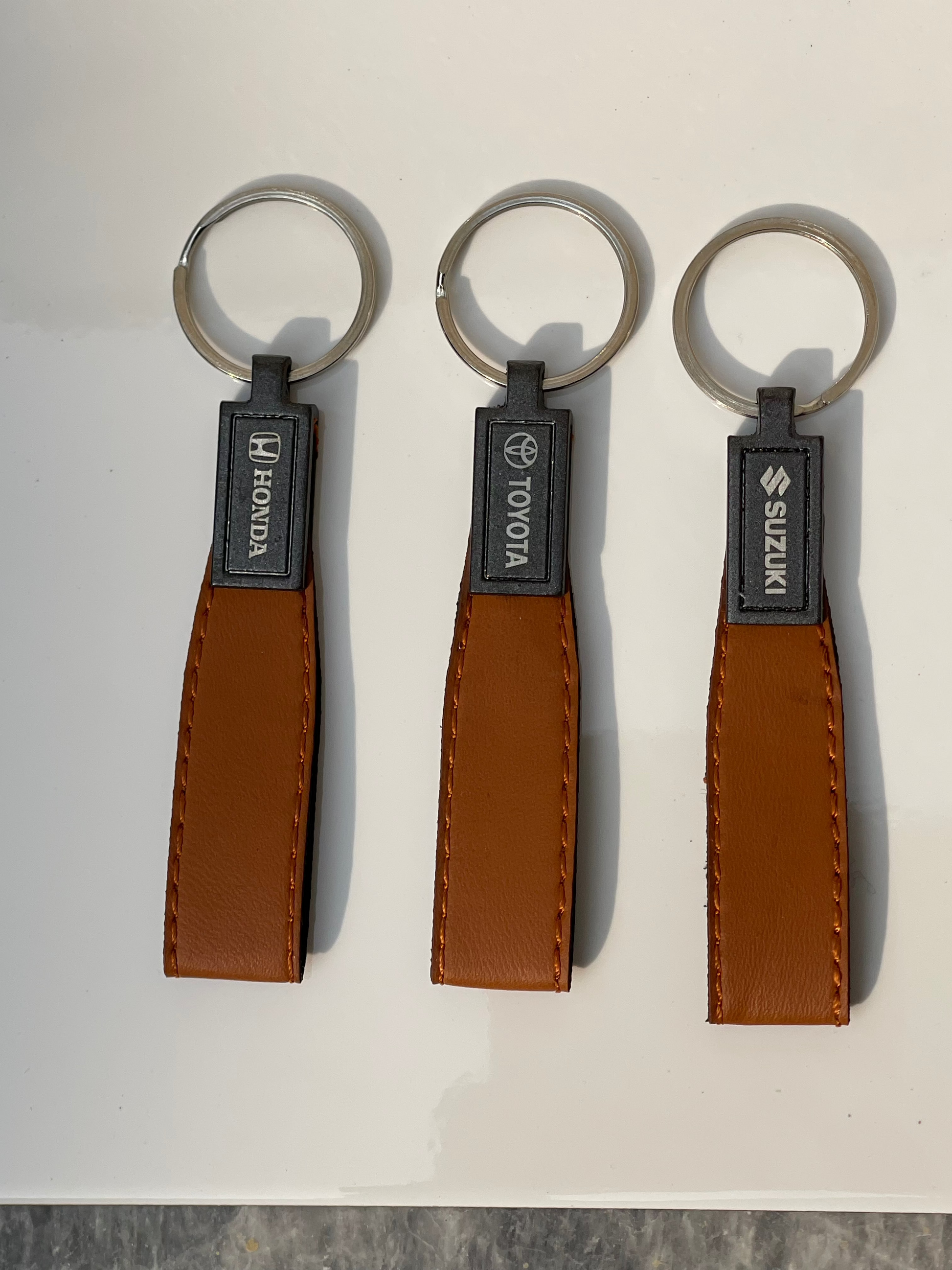 Premium Brown Leather Keychain with Suzuki, Toyota, and Honda Logos
