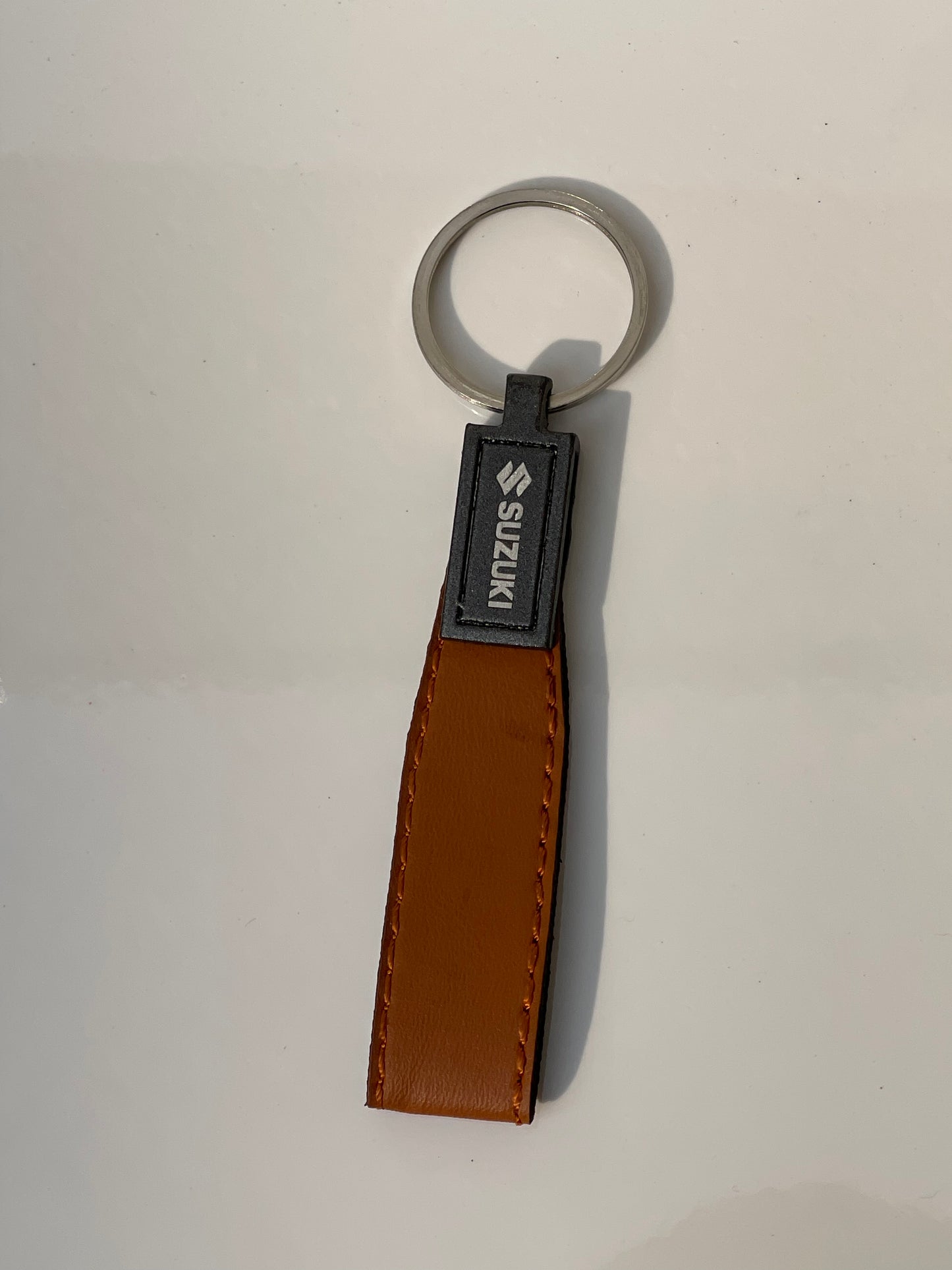 image of premium quality keychain with logo on Suzuki